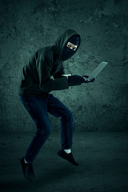 haker jest kradzież komputera - rudeness risk computer business zdjęcia i obrazy z banku zdjęć