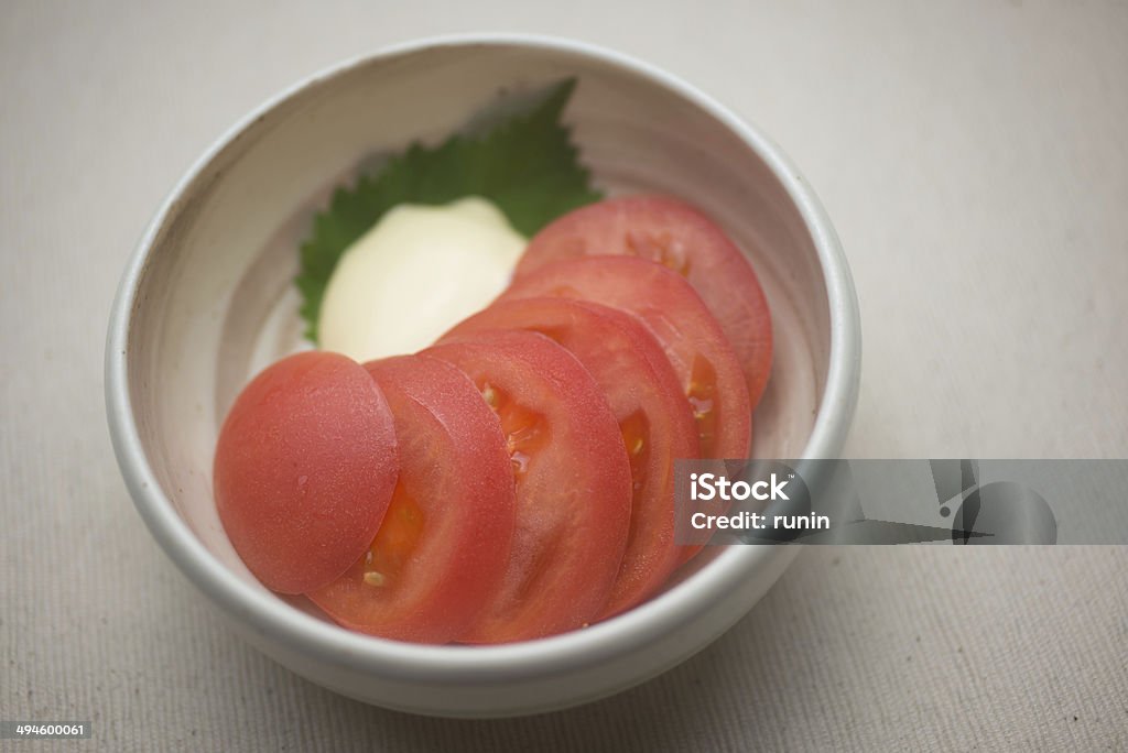 Japanese cuisine hiyashi tomato Japanese cuisine hiyashi tomato (Chilled sliced tomato,Tomato salad ) Appetizer Stock Photo