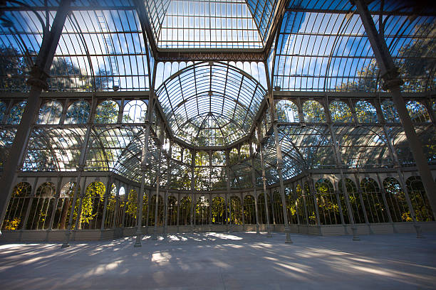 Inside the Palacio de Cristal, Madrid Wide angle shot of the interior of the Palacio de Cristal, Madrid. palacio de cristal photos stock pictures, royalty-free photos & images