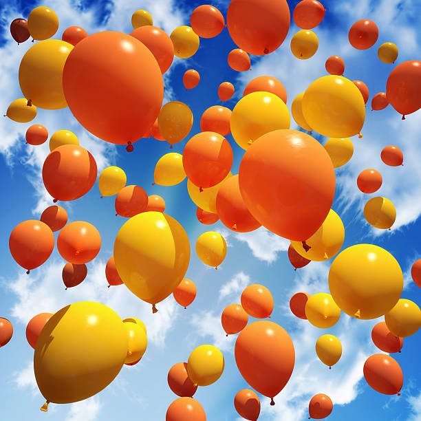 Balloon's released into the sky stock photo
