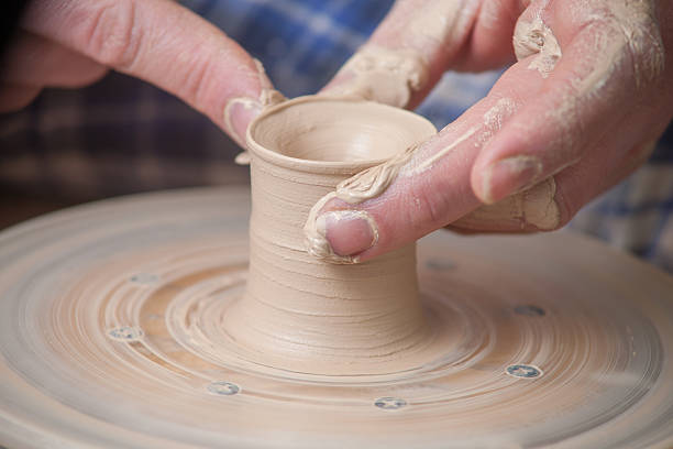 istock Hands of a potter 494602339