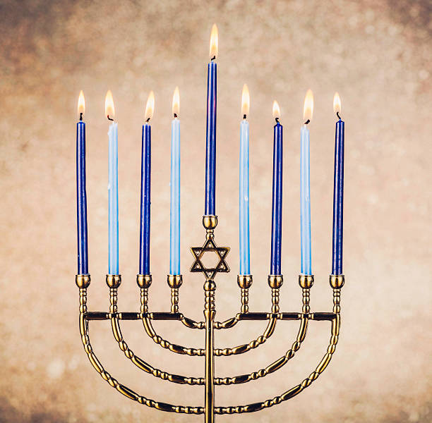 istock Burning Candles in Menorah 494604958