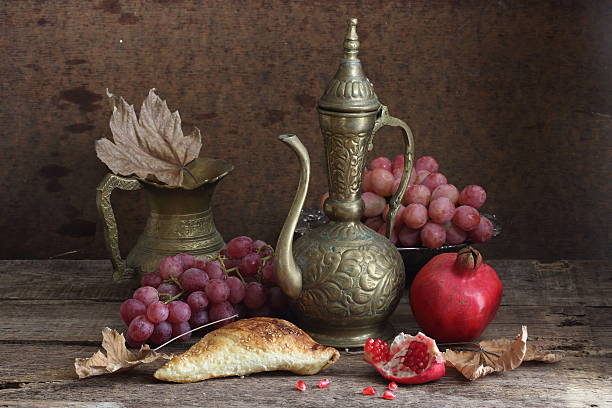 istock Wine in copper jug submitted with grapes 494605372