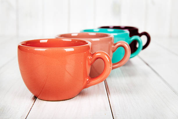 istock cup of coffee in beautiful female hands 494607320