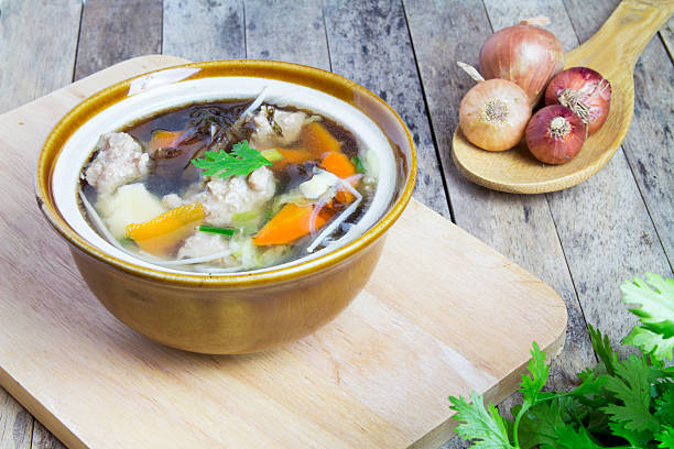 istock Thai soup recipe in a bowl on wooden 494608096