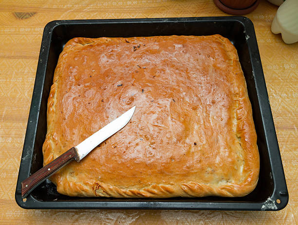 istock Pie with potatoes and cabbage on the baking sheet 494608560