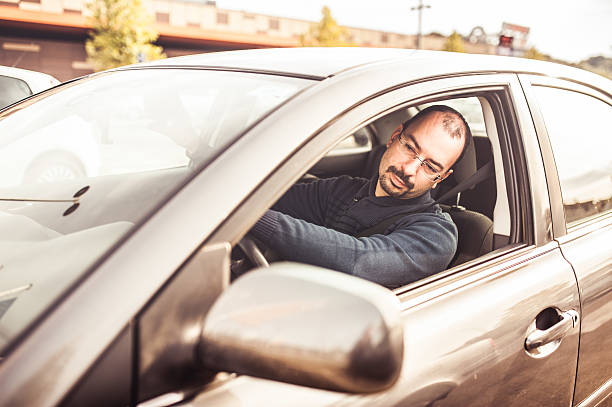 istock Portrait of a Man Driving a Car 494609742