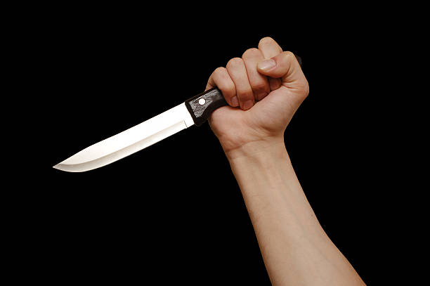 istock The man with a knife in a hand. Closeup 494610080