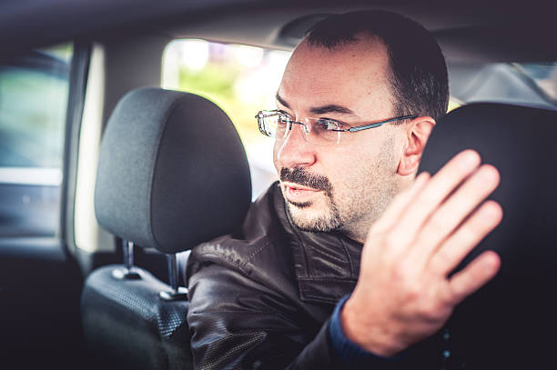 istock Portrait of a Man Driving a Car 494610412