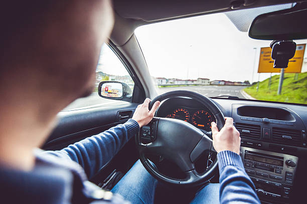 istock Man Driving a Car, Driver's Point of View 494610482