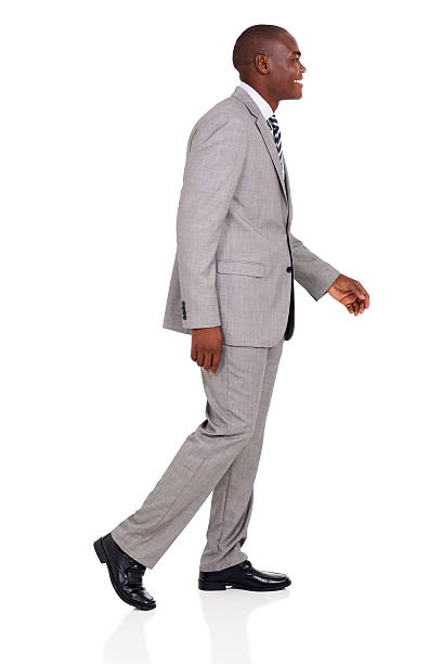 istock young african american businessman walking 494610494
