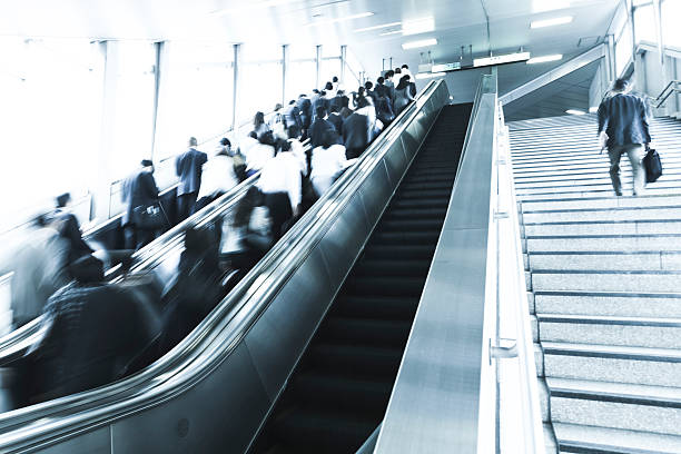 istock City Commuters on Escalator and Stair in the Morning 494610694