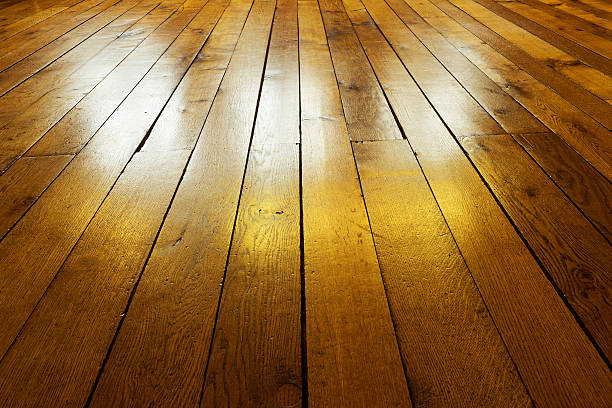 istock Old painted wooden floor in backlight 494612780