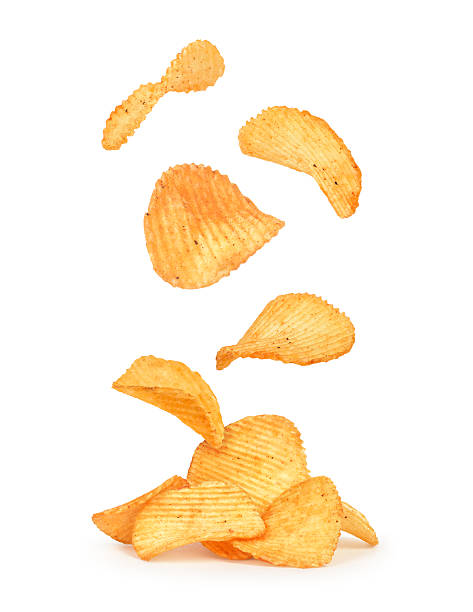 istock potato chips in the air on an isolated white background 494613648