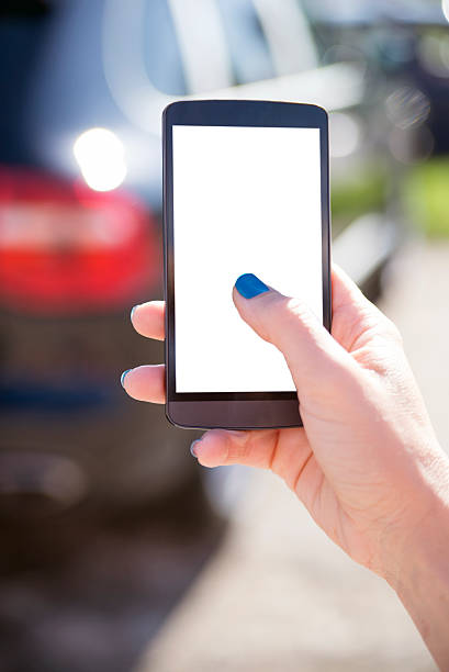 istock Holding white screen smart phone, Requesting a taxi from a cell phone 494613724