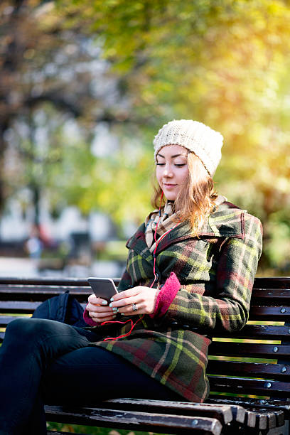 istock Beautiful  woman looking at her smartphone 494616948