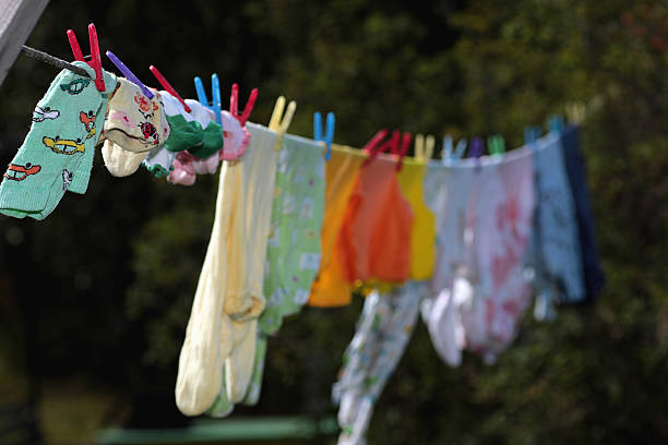 istock dry on a rope baby clothes 494617492