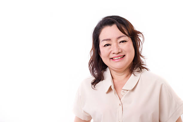 istock happy middle aged asian woman 494618478