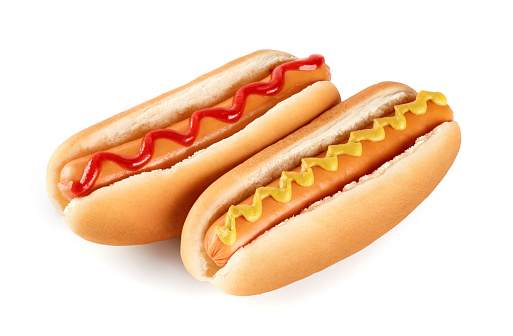 Perros calientes (Hot dogs) con salsa de tomate y mostaza aislado sobre fondo blanco. photo