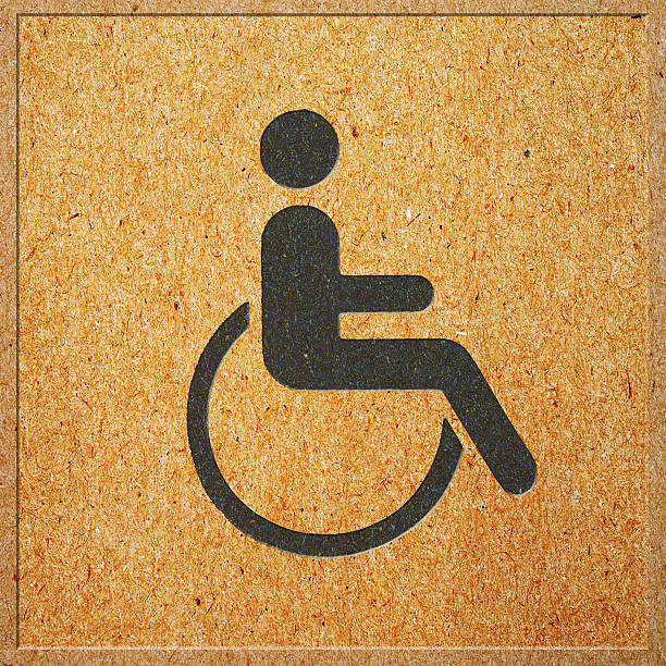 istock disabled icon sign board on paper texture background 494621761