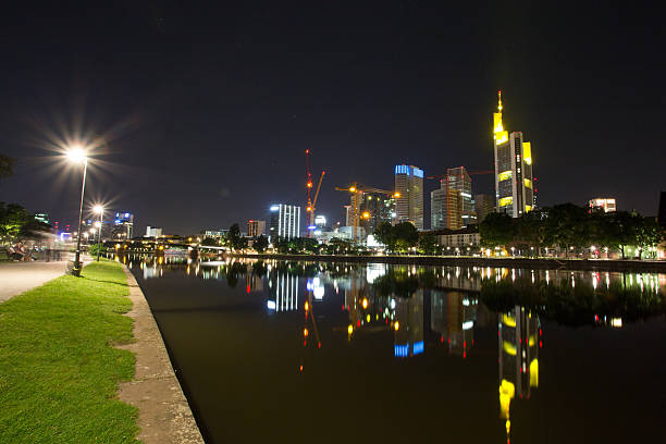 istock frankfurt city skyline and the main river at night 494622045