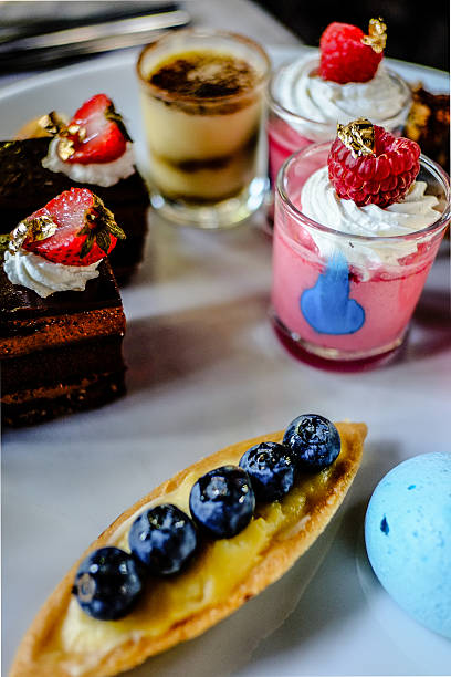 istock various delicious desserts presented on a white plate 494622529
