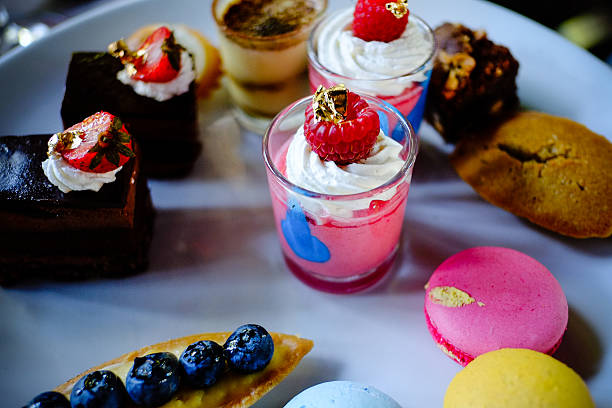 istock various delicious desserts presented on a white plate 494623693