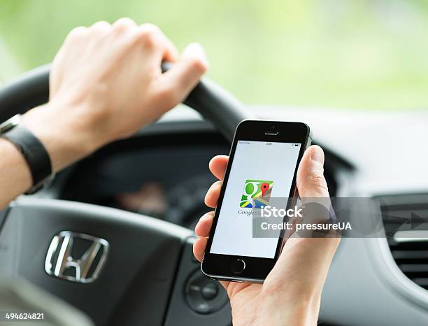 Google Maps Application On Apple Iphone Stock Photo - Download Image Now - Google - Brand-name, Map, Car