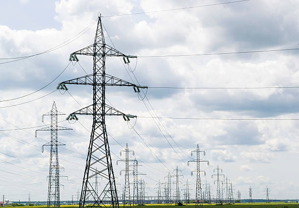 istock Electric power lines landscape 494625459