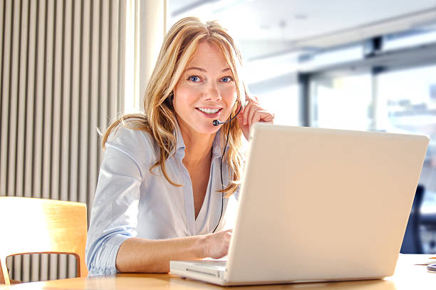istock Woman behind a laptop 494631886