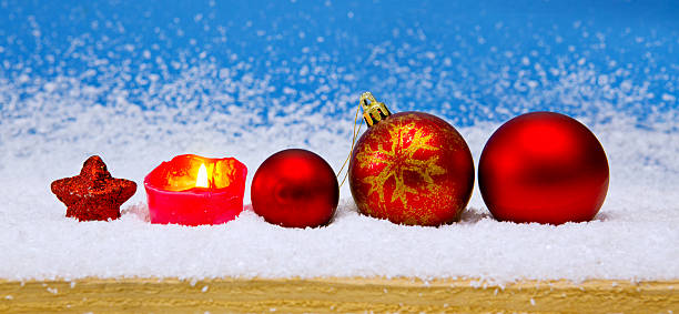 istock Red Christmas balls and Advent candle . 494637480