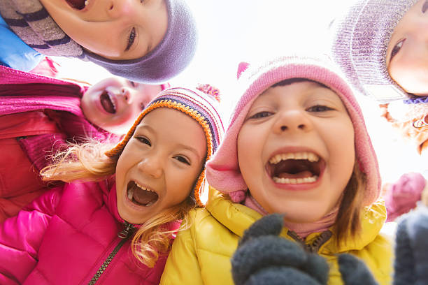 istock group of happy children faces in circle 494638300