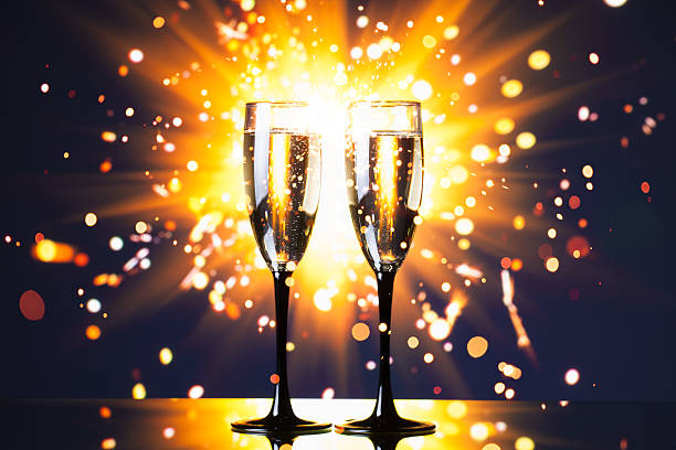 istock champagne glass against sparkler background 494638600