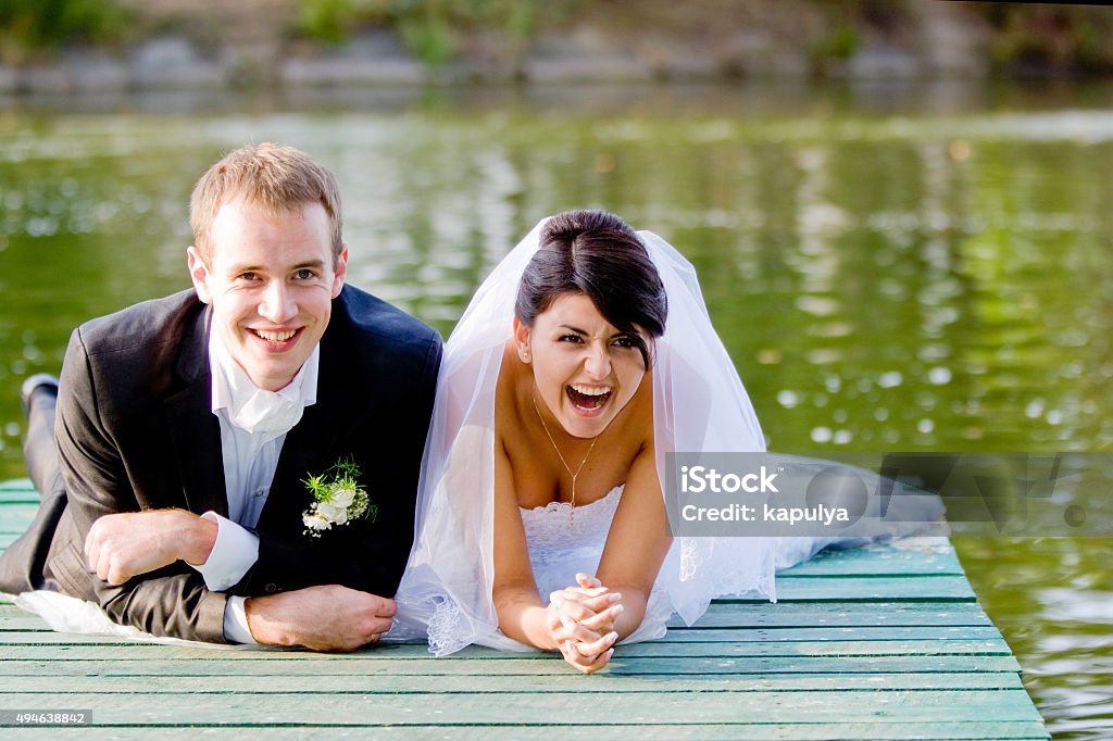 bride and groom Happy bride and groom on their wedding day 2015 Stock Photo