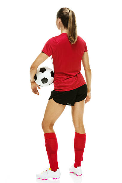 istock Back view of female soccer player 494640408