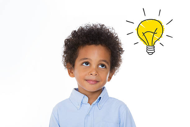 istock african boy thinking of something 494658270