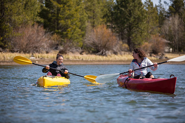 istock Young adult kayaking on river 494659016
