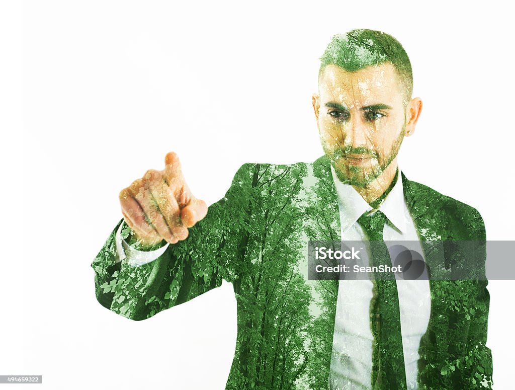 Eco Businessman Touching a Point Multiple Exposure Stock Photo