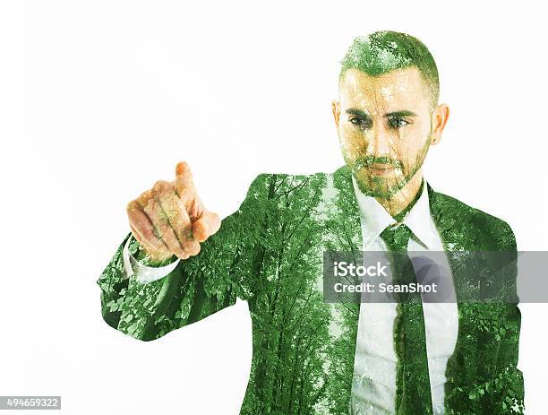 Eco Businessman Touching A Point Stock Photo - Download Image Now - Multiple Exposure, Green Color, Businessman