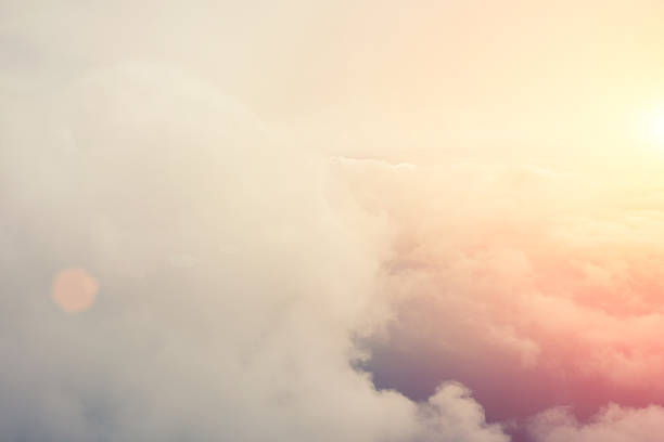 istock View from the airplane of a beautiful white clouds 494659828