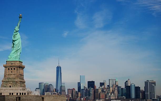 istock Statue of Liberty with downtown 494661068