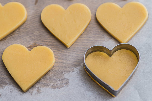 istock Baking homemade butter cookies, heart shape 494668520