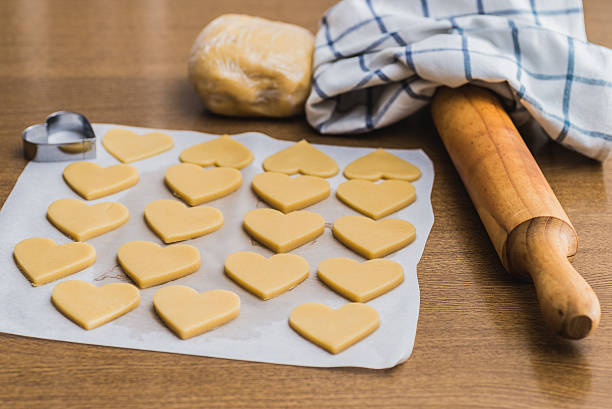 istock Baking homemade butter cookies, heart shape 494669712