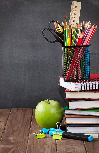 istock School and office supplies and apple 494670678