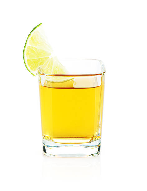 istock Shot of gold tequila with lime slice 494672430
