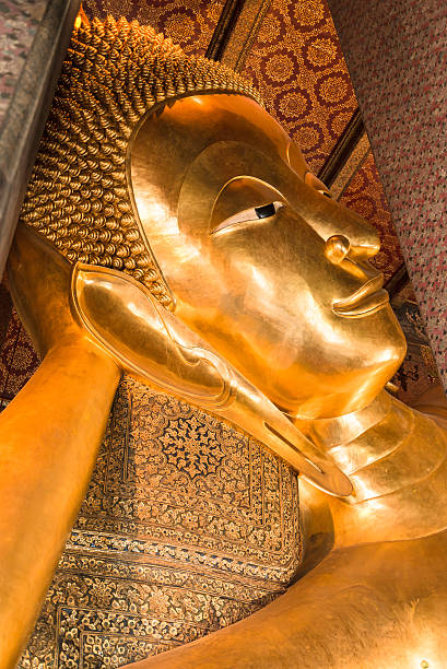 istock Big lying buddha image at Wat Po in Thailand 494672893
