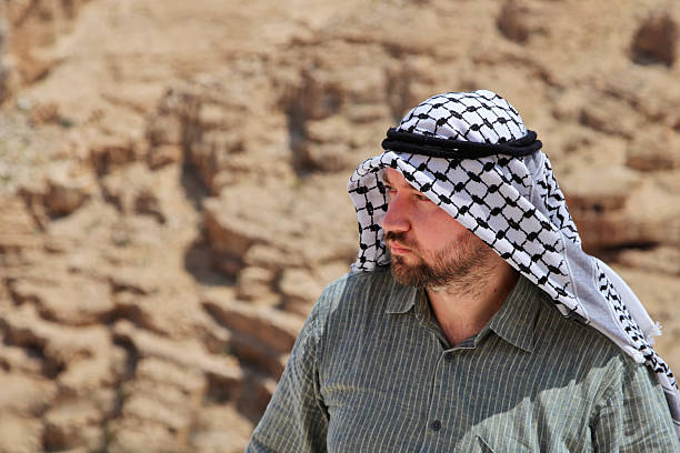 istock Man wearing a keffiyeh looking away 494674017
