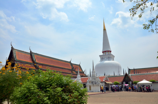 Nakhon Si Thammarat, Thailand - June 10, 2011: Many people's thai go to Wat Phra Mahathat Woramahawihan for pray with Phra Mahatat or chedi or pagoda in Nakhon Si Thammarat Thailand.