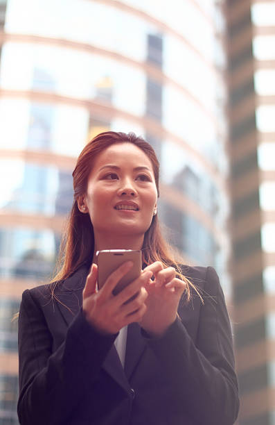 istock Businesswoman with Smart Phone 494676255