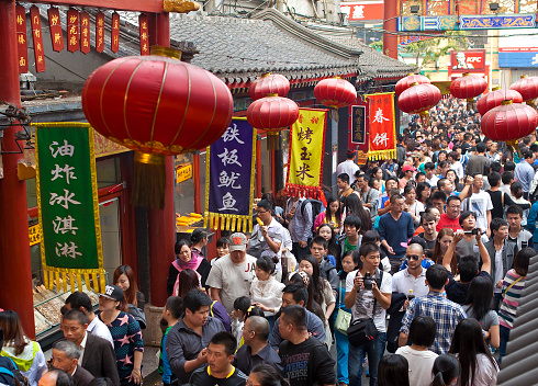 Beijing, China - October 4, 2013: People crowd famous Wangfujing snack street during National Day holiday